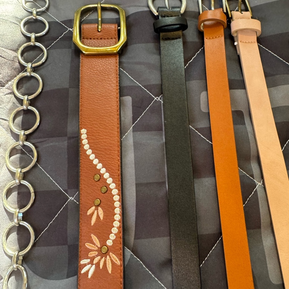 Assorted belts, leather, faux leather and metal. S/M. Brand new.